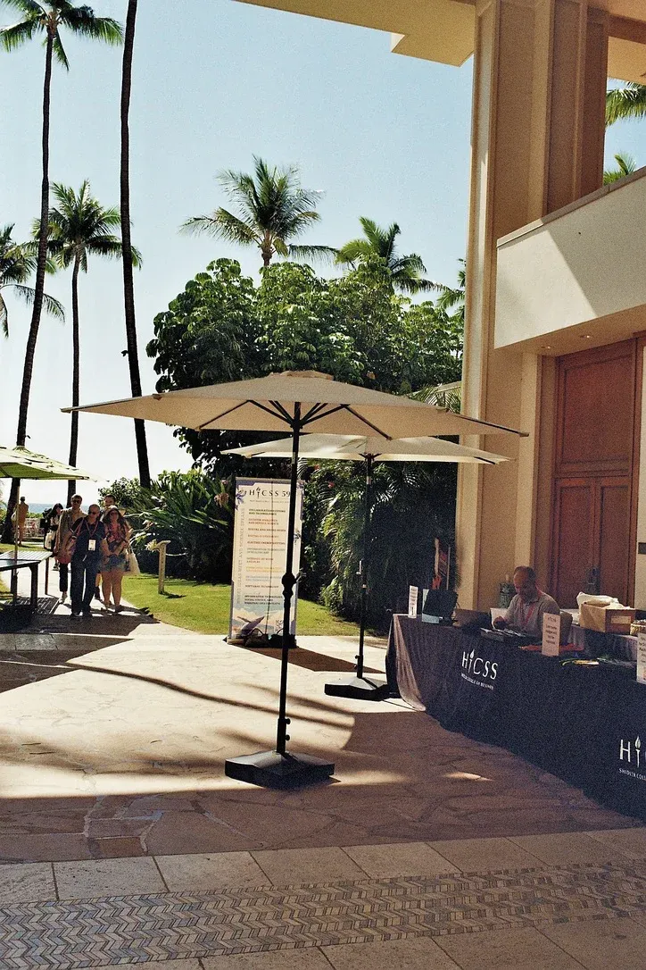 HICSS 2026 registration desk at the Hilton resort in Maui