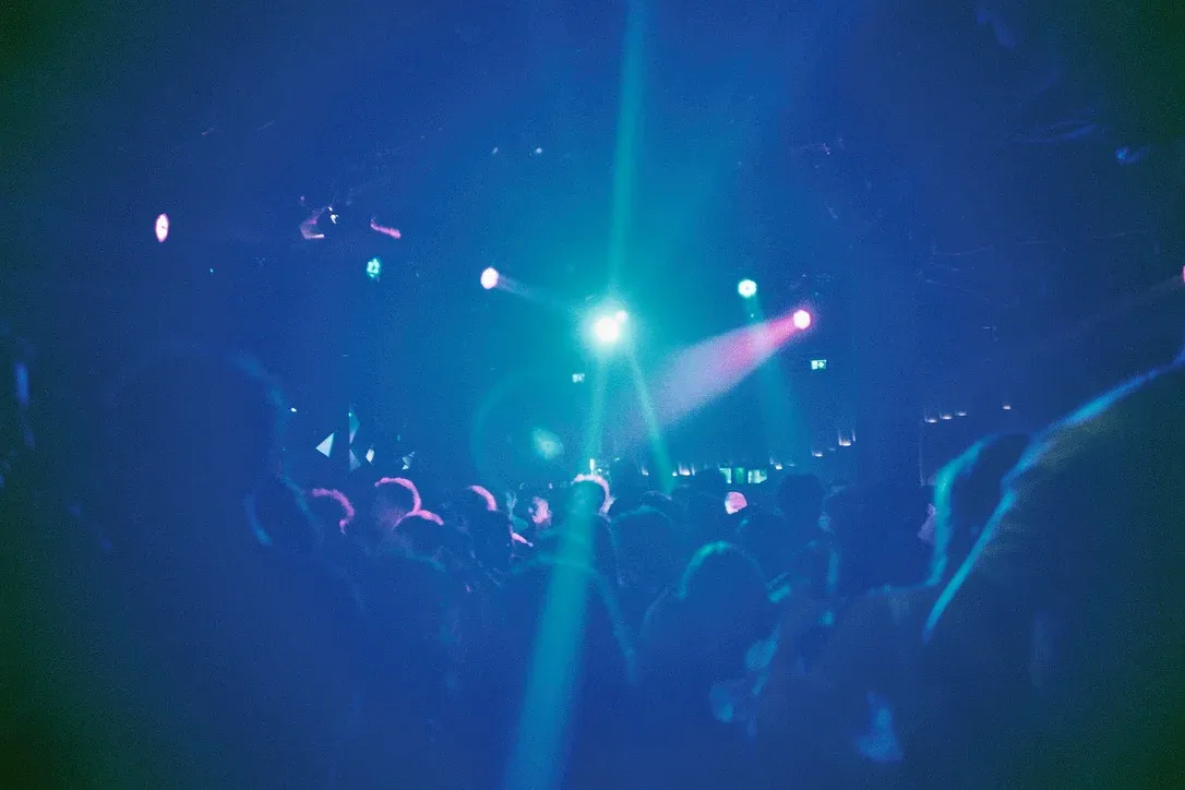 Club lighting is directly reflected in the lens of the Albertina Museum’s after-party at the O-Club